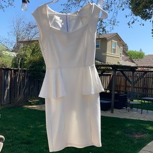 White peplum dress